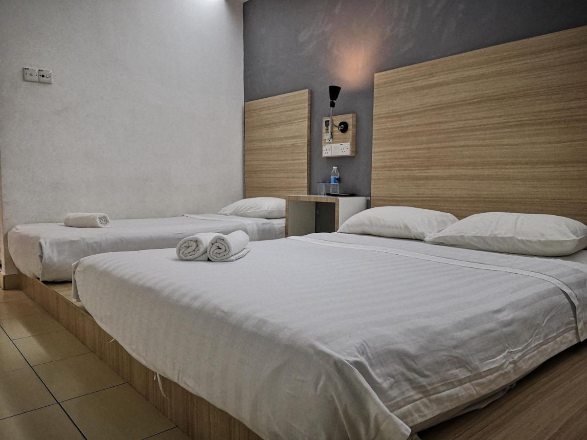 Dragon Door Hotel Sitiawan Luaran gambar